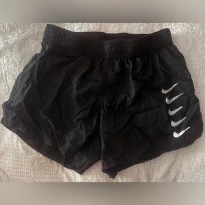 Black Nike XS athletic shorts multiply checks